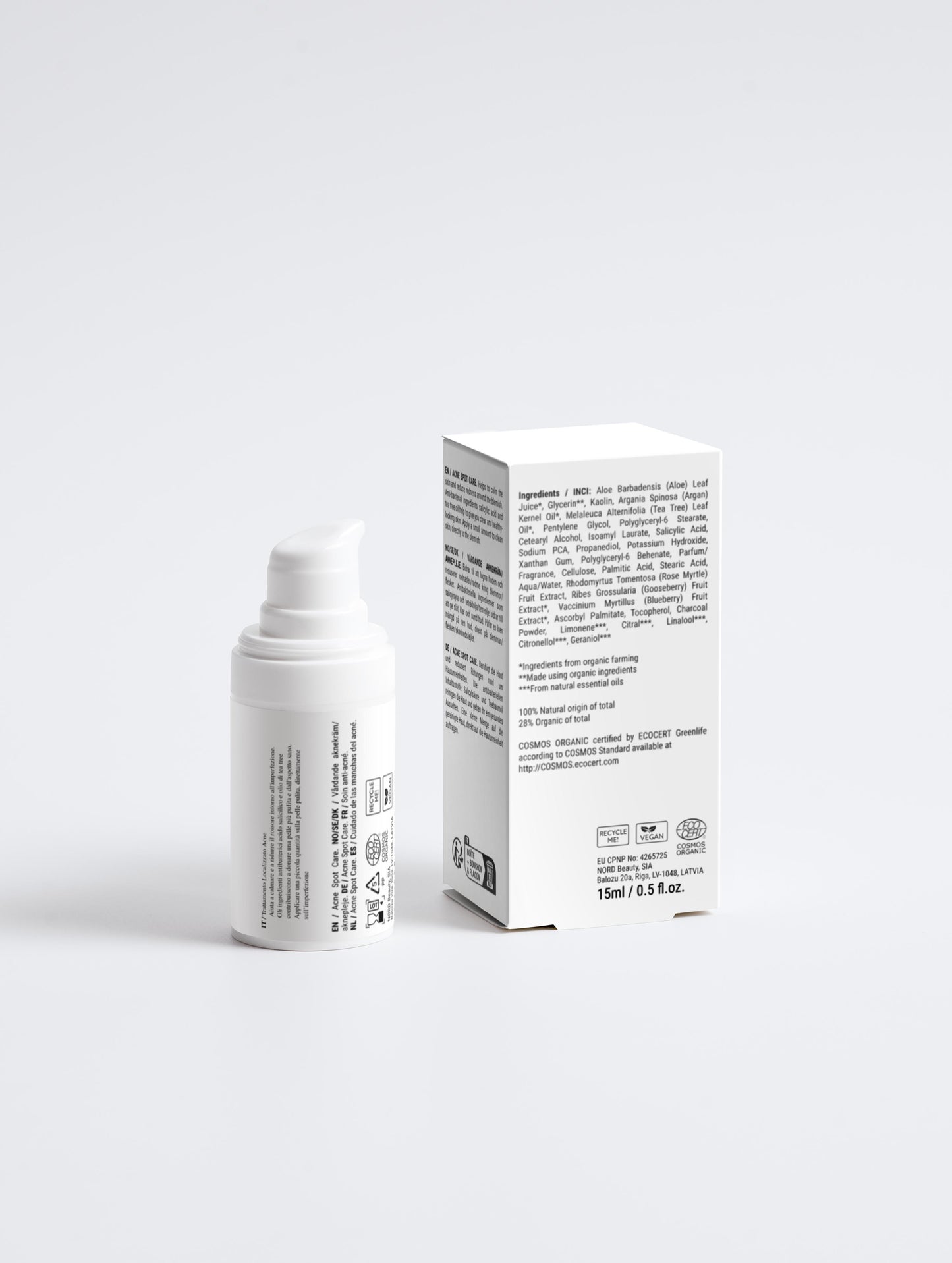 White skincare bottle and box on a light gray background