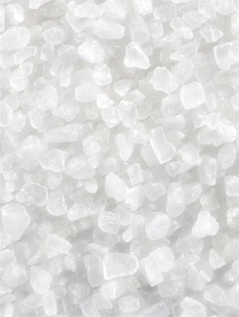 Close-up of white pebbles on a white background