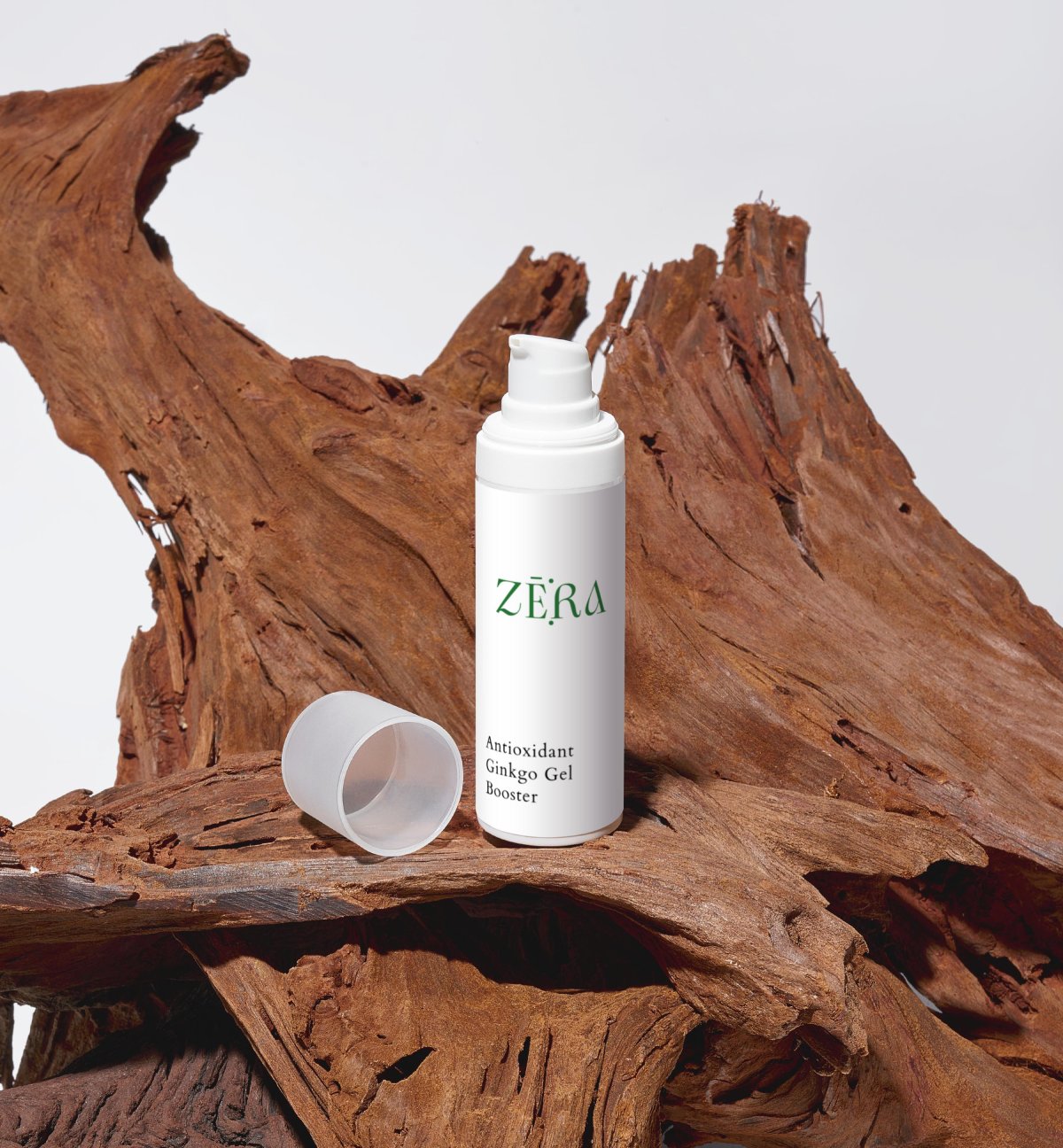 ZERA antioxidant gel bottle on a wooden surface
