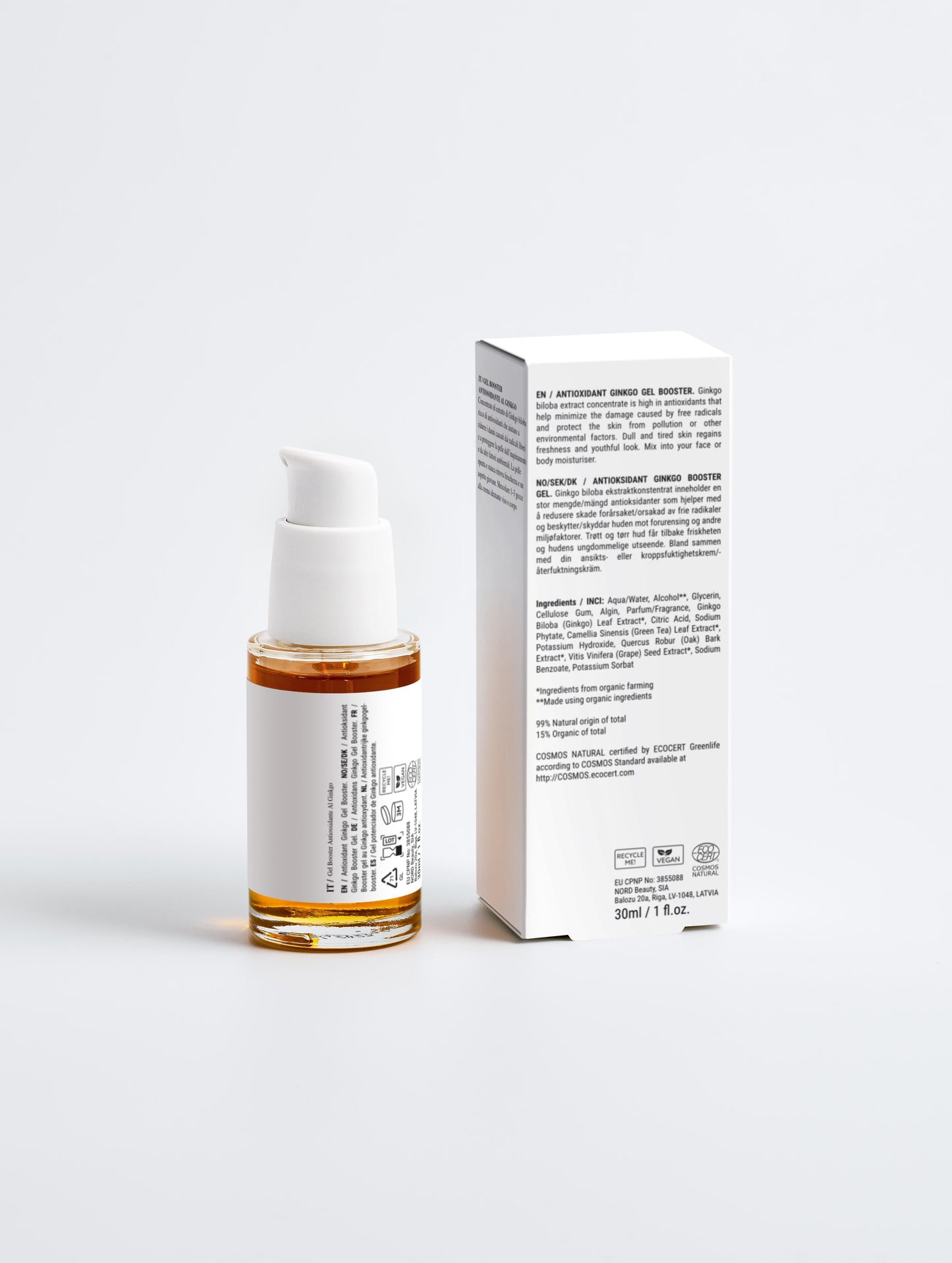 Skincare bottle with cap and box on a white background